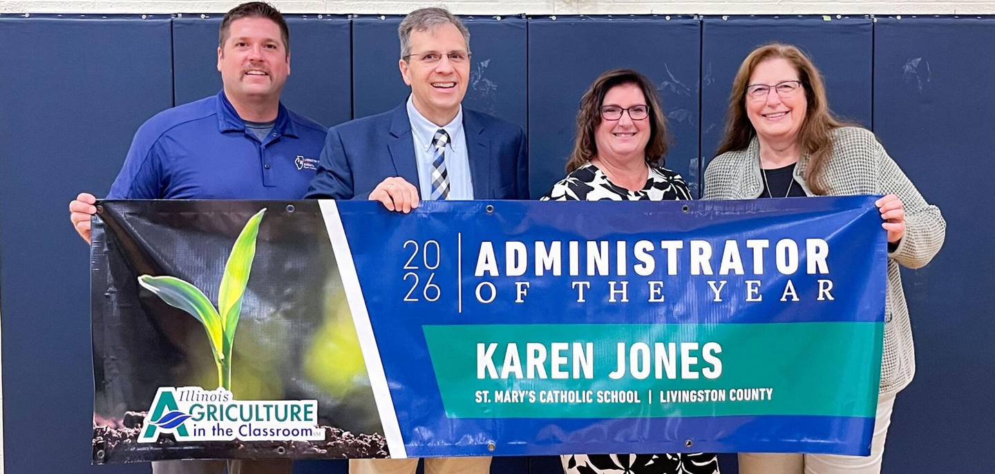 Illinois Agriculture in the Classroom Administrator of the Year Karen Jones (third from left) shares the honor with (from left) Chris Bunting, Livingston Farm Bureau County manager; Kevin Daugherty, IAITC education director; and Debbie Ruff, Livingston County Soil and Water Conservation District and IAITC.