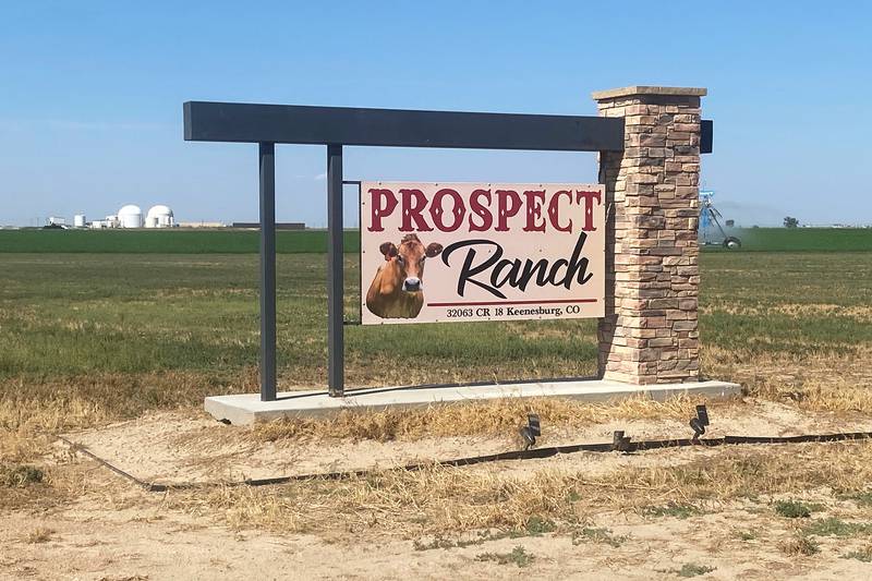 A sign stands at Prospect Ranch outside of Prospect Valley Dairy near Keenesburg in northern Colorado.