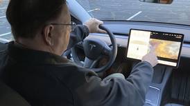 Drivers playing video games? U.S. is looking into Tesla case