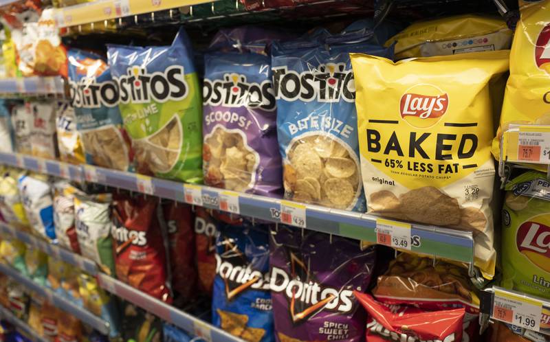 Potato chips are displayed at a store.