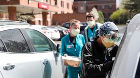 Virus surge in Michigan slows Ram truck plant
