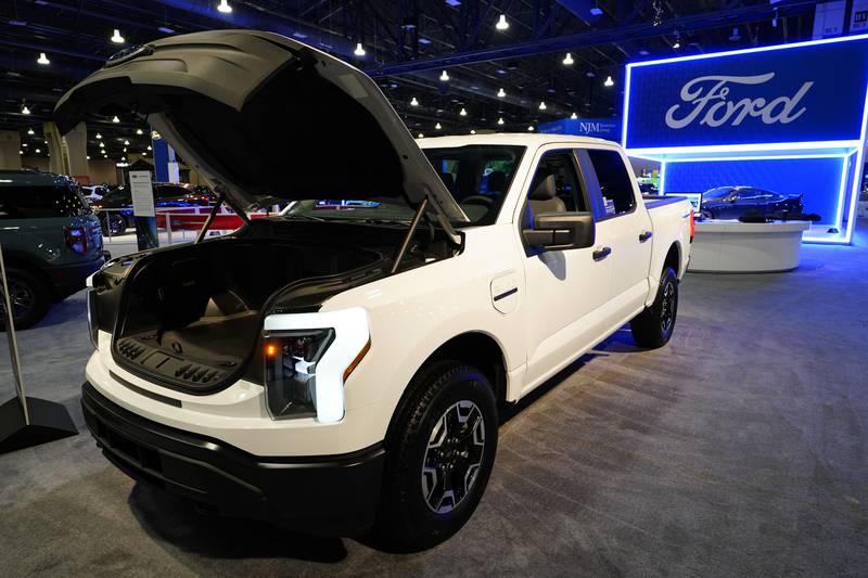 The Ford F-150 Lightning is displayed at the 2023 Philadelphia Auto Show.