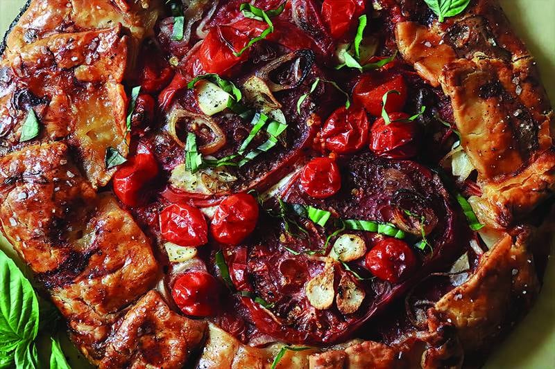 A little rustic charm, a lot of tomato flavor — this galette is perfect warm, at room temp or served in elegant wedges.
