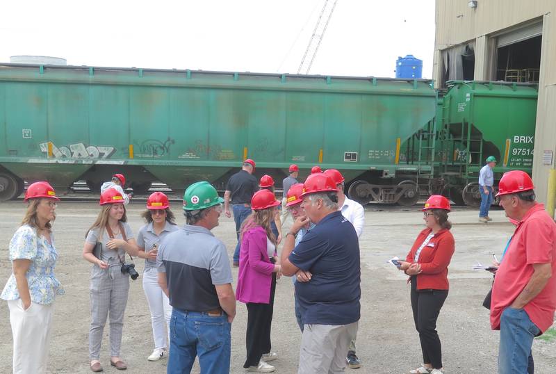 Kerry Fogarty (center left) leads a tour of Incobrasa Industries for representatives from Clean Fuels Alliance America, soybean growers, media and local governmental officials. An expansion is now underway that will double its processing capabilities, enabling the facility to use more locally-grown soybeans.