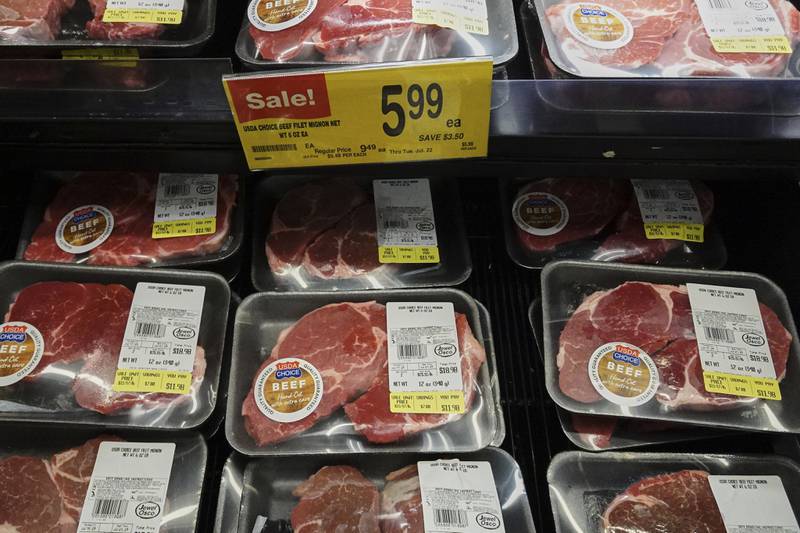 A price for beef is displayed on the edge of a shelf at a grocery store in Mount Prospect, Illinois.