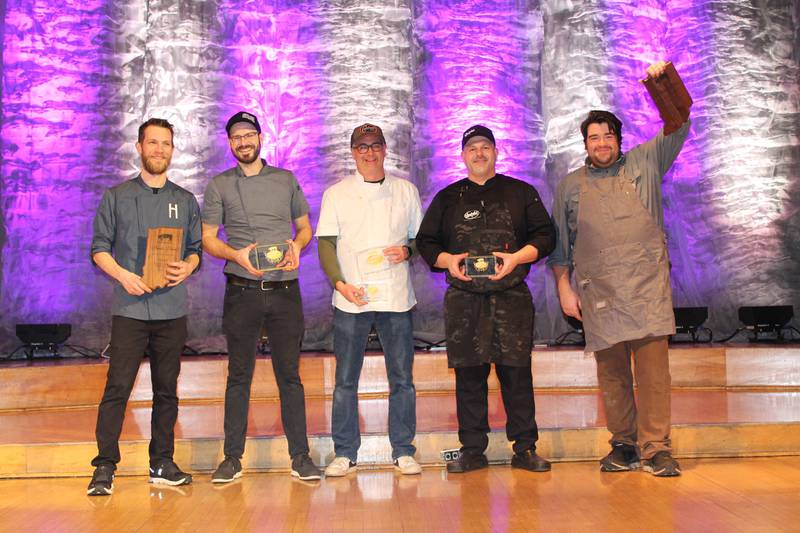 Taste of Elegance winning chefs Daniel Keiner (from left), Steven Amore, Craig Baker, Chefski Laskowski and Michael Gomez pose with their awards.