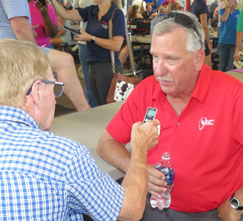 Brian Duncan, Illinois Farm Bureau president, is interviewed by Roger Ward, WLDS farm director, of Jacksonville, during the Illinois State Fair’s Ag Day media event.