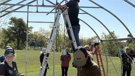 Volunteers build high tunnel in Lake County