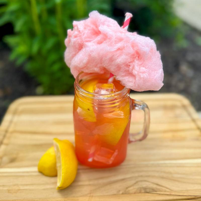 Cotton Candy Lemon Shake Up by Urick Concessions. A classic lemonade shake-up with a sweet twist—spun with a fluffy wad of cotton candy inside and topped with a cloud of cotton candy on the straw. Tart, sweet and totally fun.