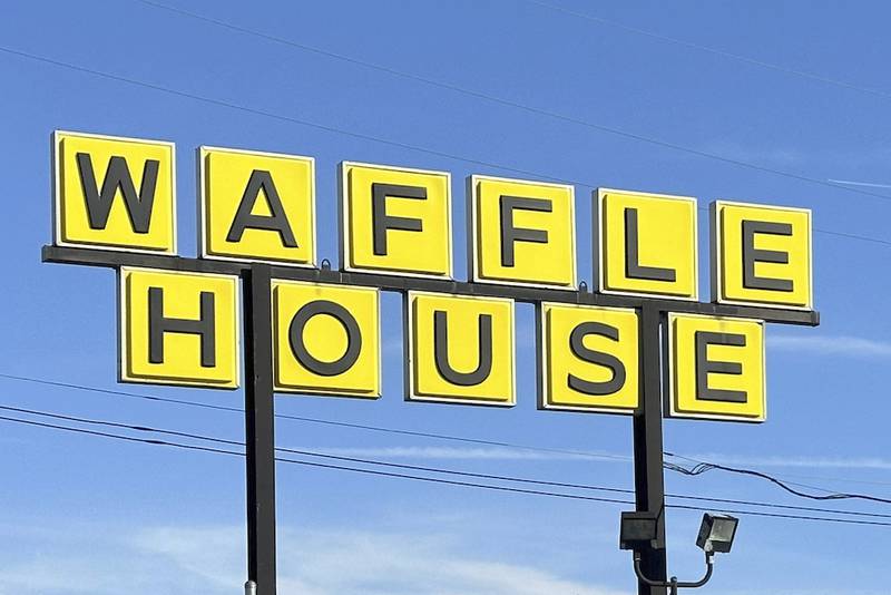 A Waffle House sign is shown in Indianapolis.