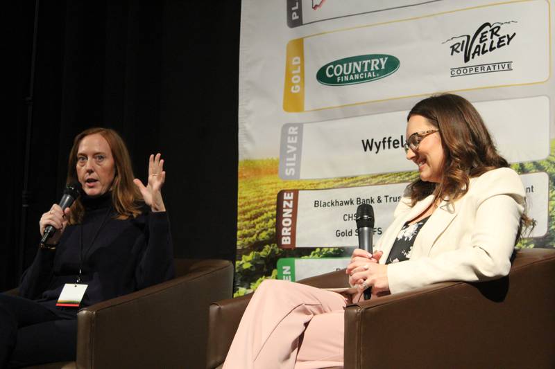Josie Rudolphi (left) and Adrienne DeSutter talk about the importance for women to focus on self-care during a panel discussion at the Women in Agriculture Conference. Self-care is not a reward, DeSutter says; it is personal management that helps women give their best.
