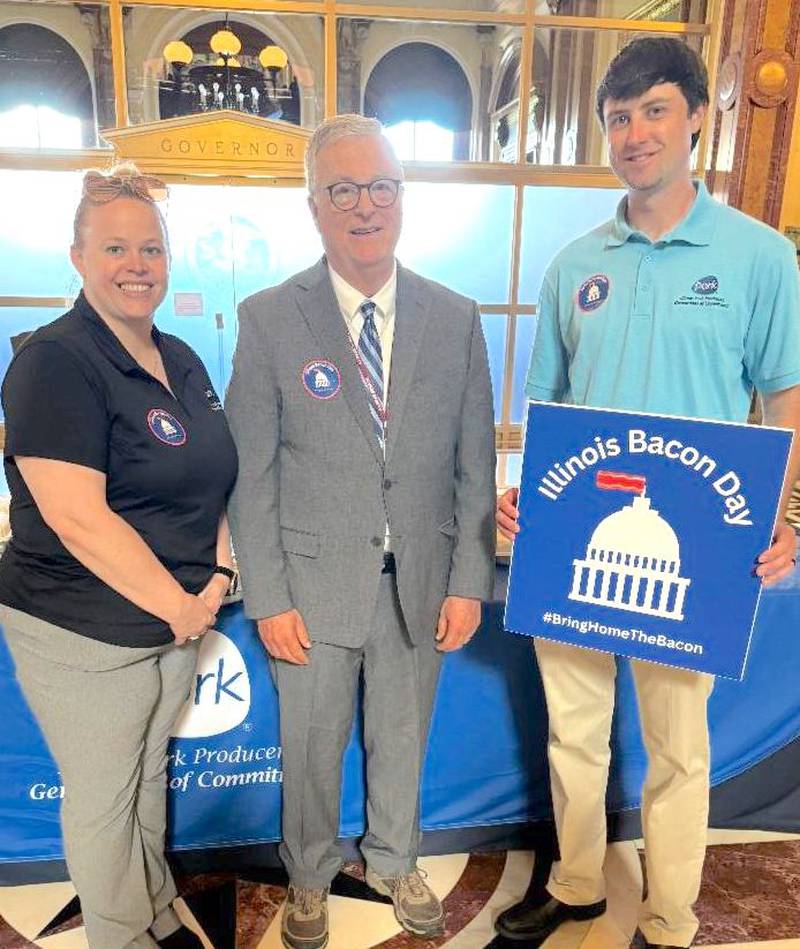 State Sen. Mark Walker, D-Arlington Heights, with Illinois Pork Producers Association board members Amanda Spinner and Tyler Main on Illinois Bacon Day.