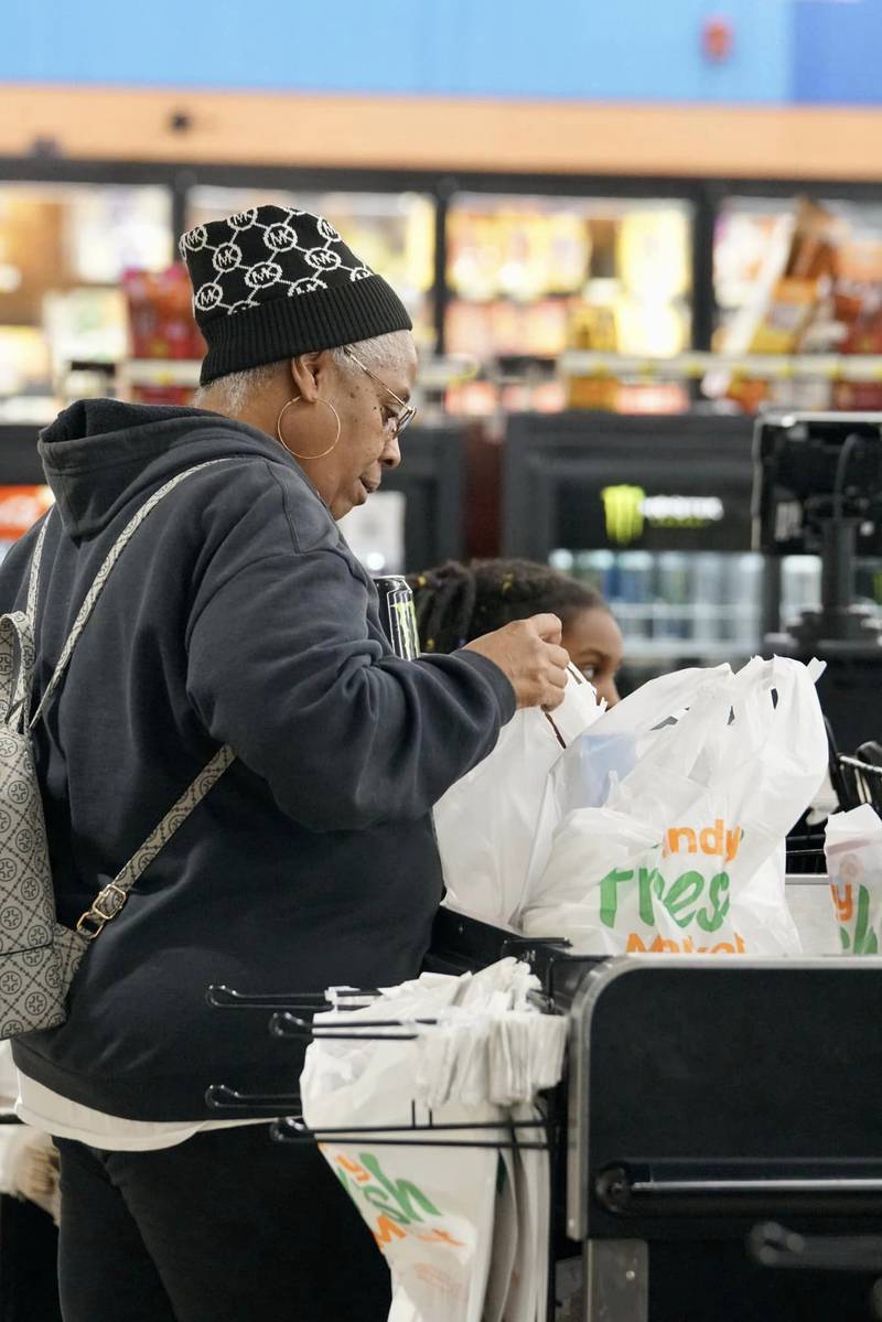 A shopper checks out at Indy Fresh Market in Indianapolis.