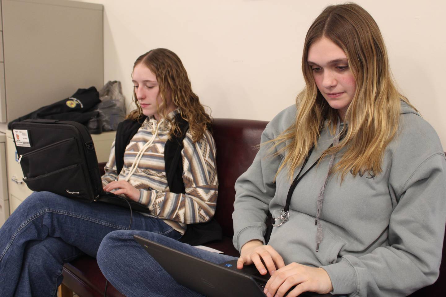 Mollie Thomson (left) and Alayna Washkowiak work on their FFA record books for the supervised agricultural experience projects. Both of the La Salle-Peru High School students were excited to study agriculture and join FFA after the program was reinstated this year.
