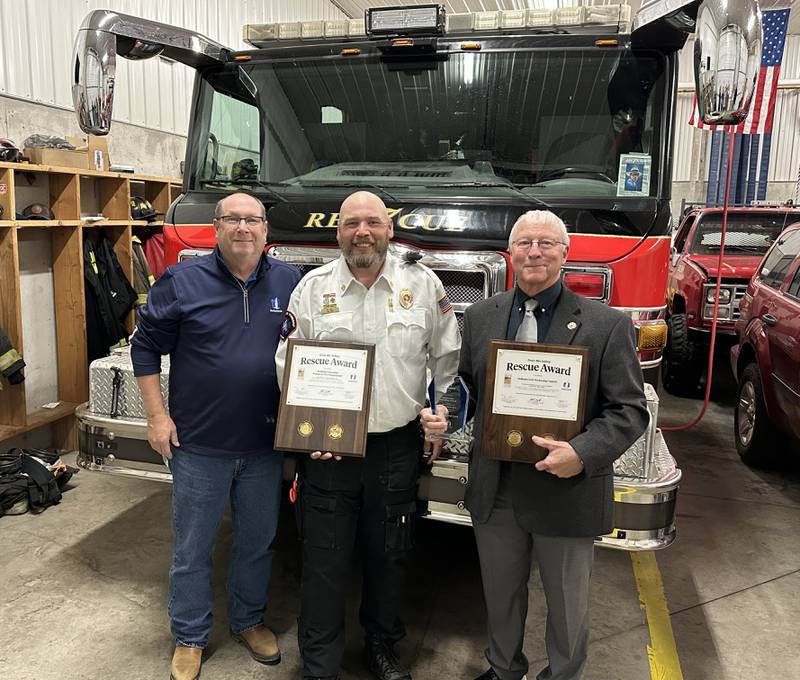 Paul Stevenson (from left), senior risk management consultant at Nationwide; Matthew Roy, fire chief at Redding Volunteer Fire Department; and Tim Gauck, president of Indiana Corn Marketing Council.