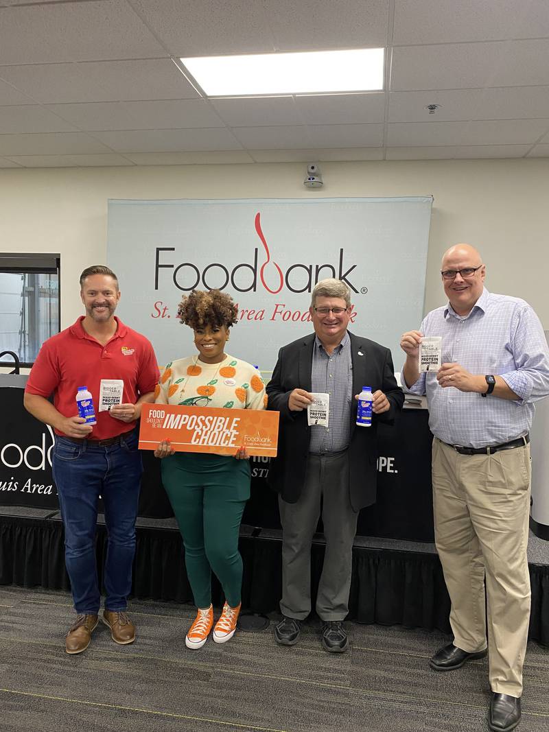 Darin Copeland (from left), Prairie Farms Dairy; Jasmine Evans, St. Louis Area Foodbank; Derek England, Prairie Farms Dairy; Alan Reed, Bigger Table.