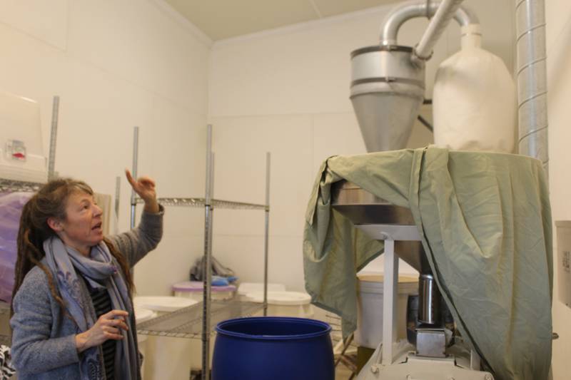 Andrea Hazzard explains how she uses her 20-inch stone mill to produce products from a variety of heirloom and ancient grains she grows, including five kinds of corn, wheat, oats, rye, barley and dry beans.