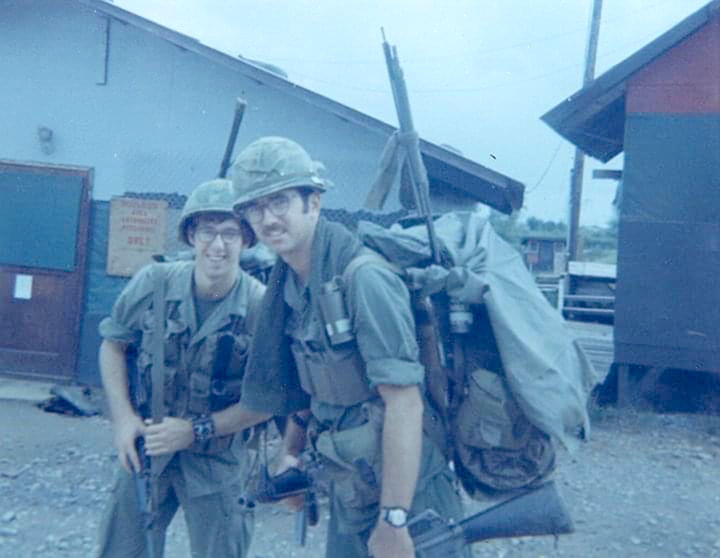 Ted Mottaz (right), an infantry company radio operator, and a fellow soldier wait for a helicopter with radio and packs ready while in Vietnam. The west-central Illinois farmer was drafted in 1971 during his first year of teaching ag at Carthage High School.