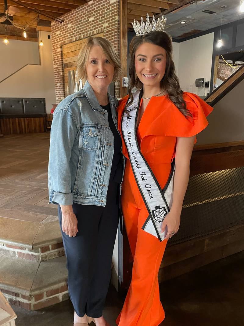 Sandy Hoke, the new director of the Miss Illinois County Fair Queen pageant, poses with 2023 Miss Illinois County Fair Queen Paige Van Dyke as Van Dyke prepared to pass on the title at the 2024 pageant. Hoke directed the Moultrie-Douglas County Fair Queen Pageant for 30 years, prior to becoming the state director. She said one of her goals is to encourage more girls to get involved in their county fair’s queen pageant and take advantage of the many life experiences that the pageants offer.