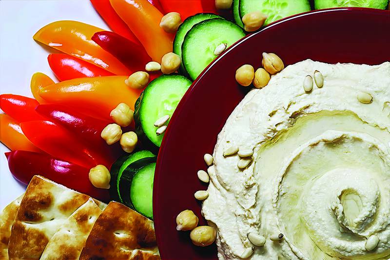 Perfectly creamy hummus, served with crispy veggies, warm pita and crunchy pita chips.