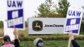 Deere workers would get immediate 10% raises under new offer