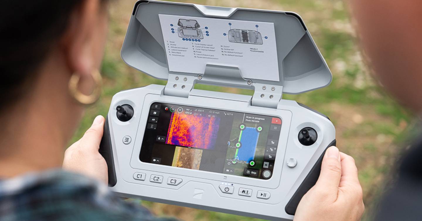Tina Jackson, graduate student in forestry and natural resources at Purdue University, looks at data collected from a drone equipped with a thermal camera. Drones with thermal cameras will be one of the tools used during a five-year study to determine the most effective method for monitoring wildlife population sizes.