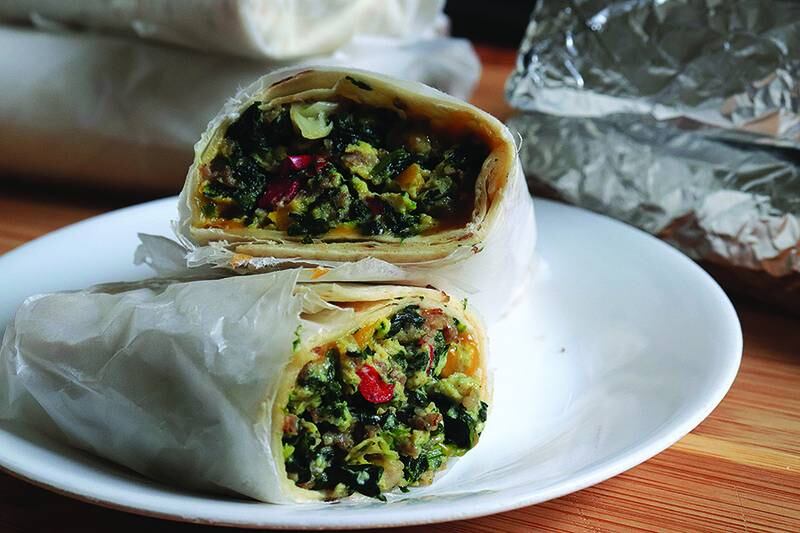 Freezer-friendly homemade breakfast burritos are an easy breakfast meal prep idea. Mix and match your add-ins to make them your own.