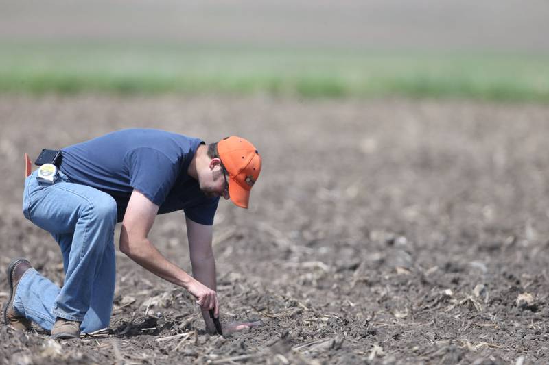 Shaun Casteel, professor of agronomy specializing in soybean production, planting soybeans at ACRE during early planting season.