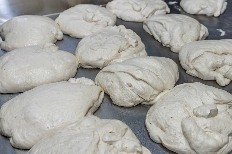 Sourdough bread loaves begin the rising process at Nicola's Heavenly Cucina in Lockport on Dec. 18, 2024.