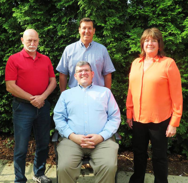 Jonathan Shepherd (seated) was elected the 2024-2025 president of the Farm Financial Standards Council. Other officers elected include Russell Morgan (from left), vice president; Jeff Bushey, secretary/treasurer; and Deena Brown, immediate past-president.