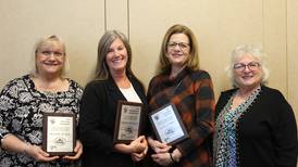 IAW presents awards to three outstanding members