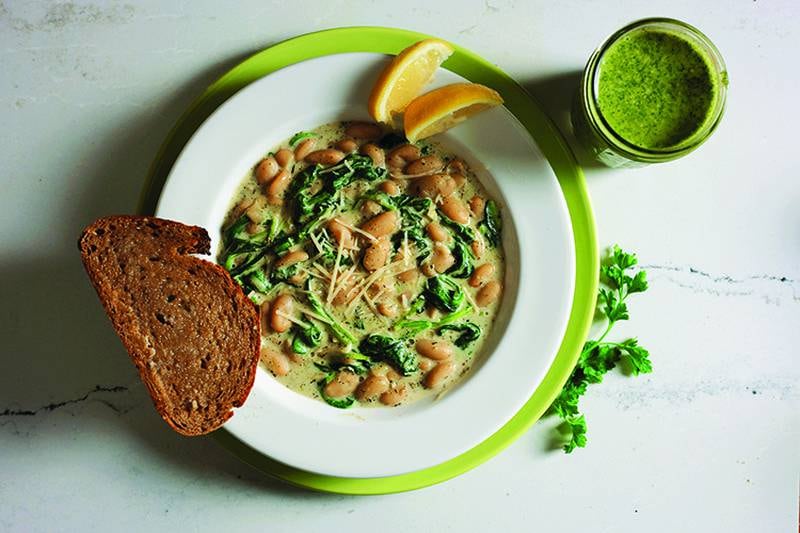 Creamy white beans and spinach finished with Bright & Bold Lem-on Herb Dressing.