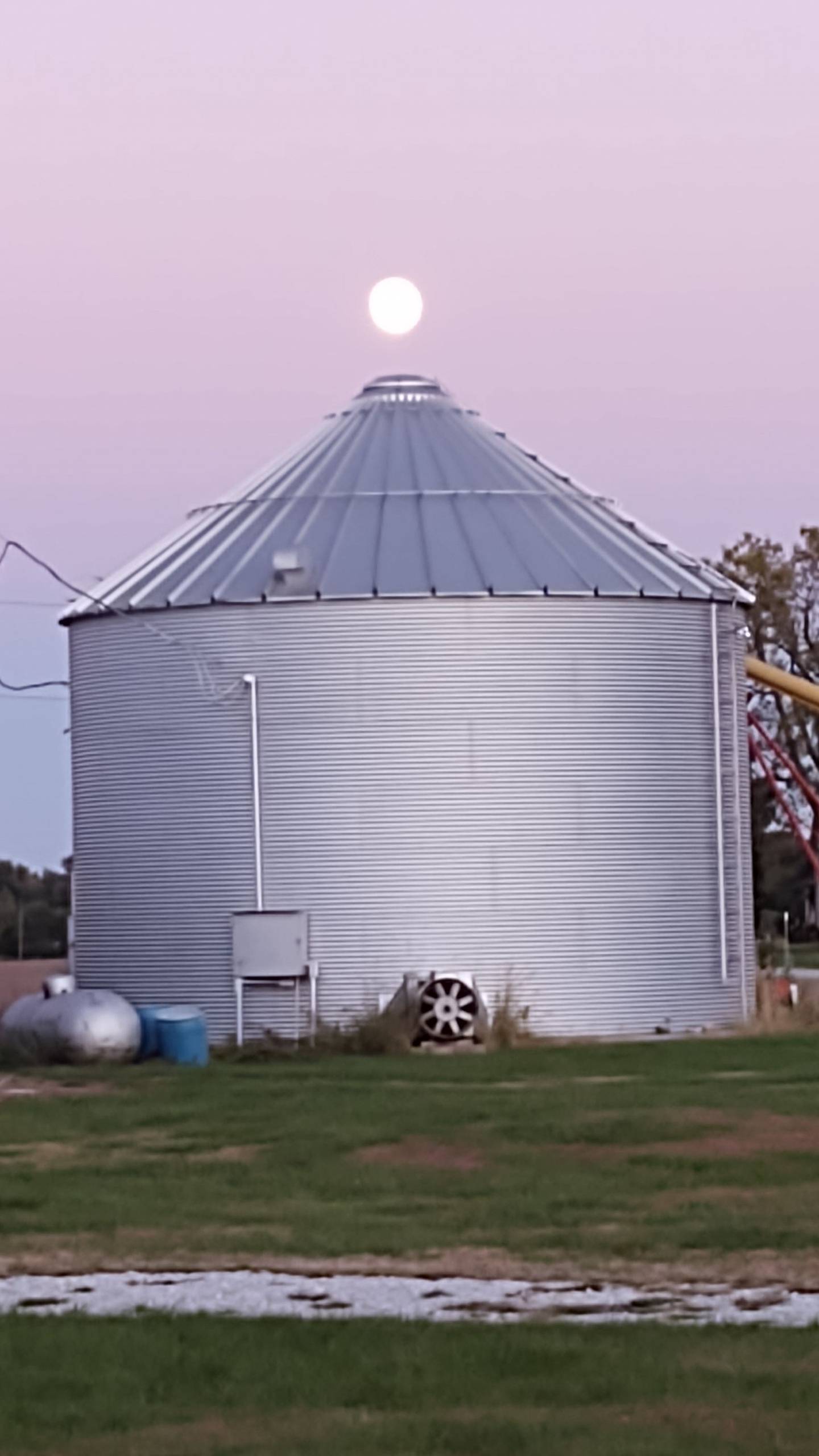 “Harvest Moon” — Joette Webber: “During harvest, the moon rose right over the top of the bins while unloading.”