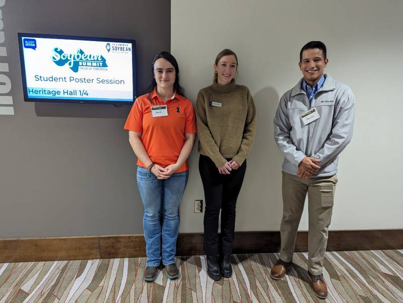 Heidi Allen Asensio (from left), Darby Danzl and Danillo Leite won first, third and second, respectively, at the Student Research Poster Competition at the Illinois Soybean Association’s Soybean Summit.