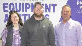 Auction business travels farm show circuit