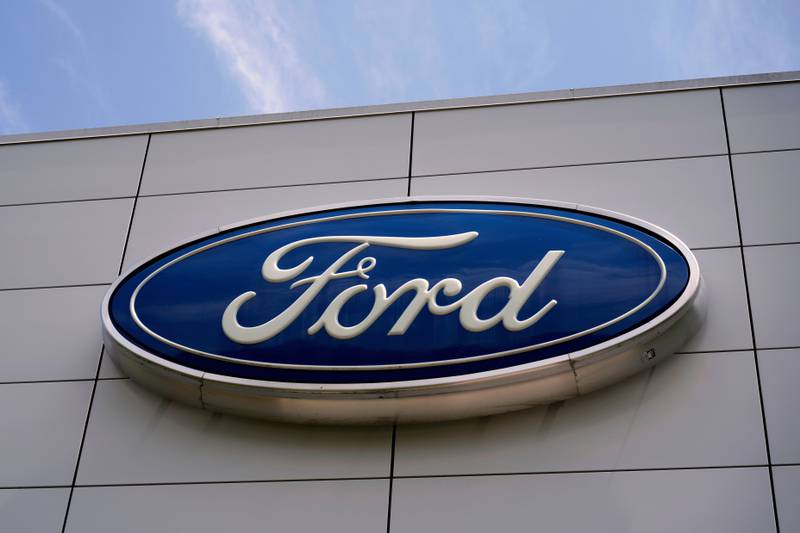 The Ford logo is displayed above the entrance to the Ford Motor Company Kentucky Truck Plant in Louisville.