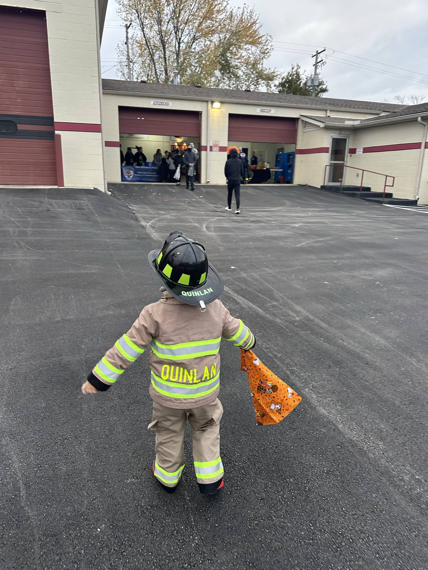 Patrick Quinlan, 4, dresses up as a fireman for Halloween.