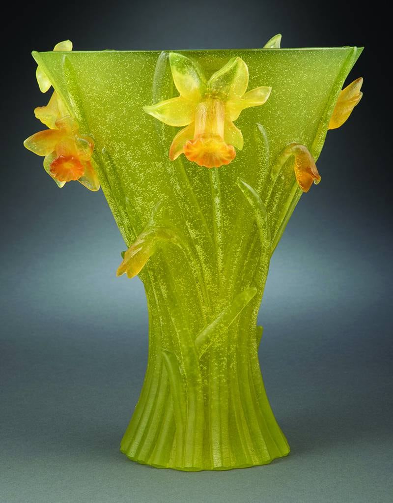 Daum designed many vases with flowers molded from ground glass. A vase like this looks like a bouquet on its own, and the flowers still look fresh after about a hundred years.