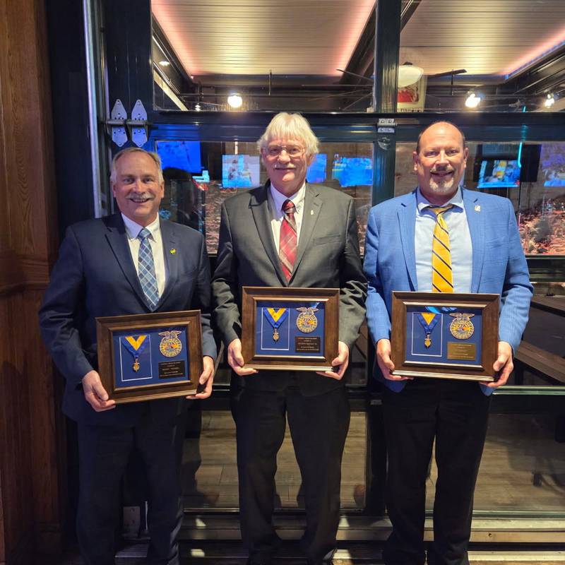 Rodney Weinzierl (from left), Kenneth Hartmann Jr. and Jim Tarmann receives their Honorary FFA American Degree at the National FFA Convention & Expo on on Oct. 31. Weinzierl and Tarmann are IL Corn employees, and Hartmann is a past IL Corn and current National Corn Growers Association farmer leader.