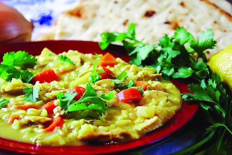 Thanksgiving turkey gets a spicy new life in this curry-kissed coconut soup.