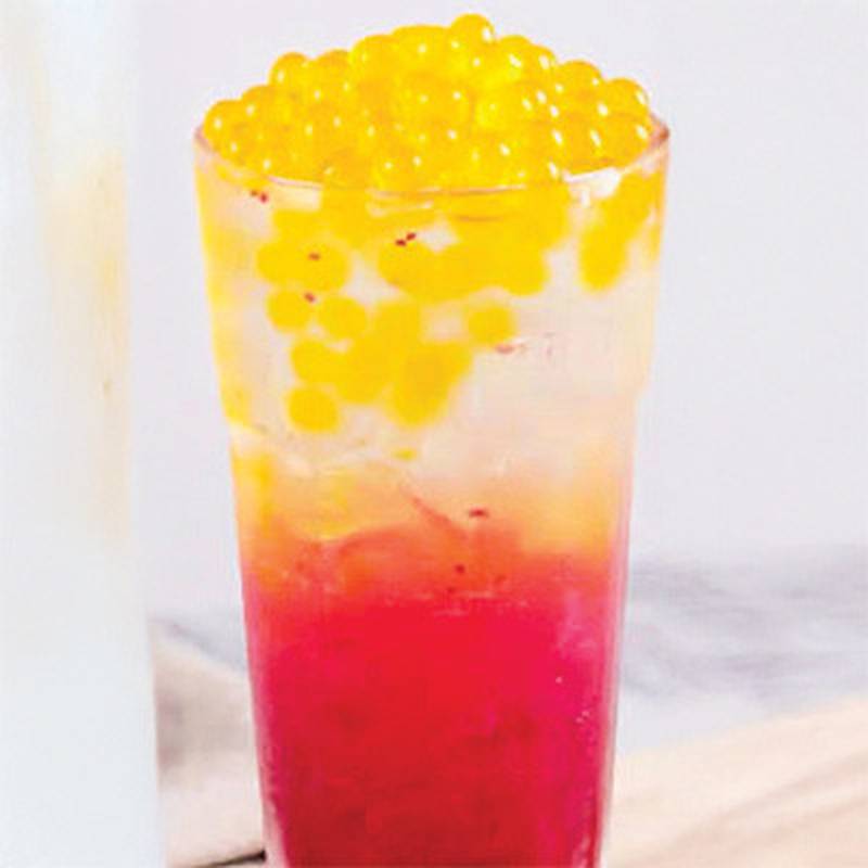 Passion Fruit Boba Lemonade Shakeup by Indiana Ribeye. A refreshing sip of summer at Indiana Ribeye’s Old Fashioned Lemonade Stand. Shakeup your lemonade with boba.