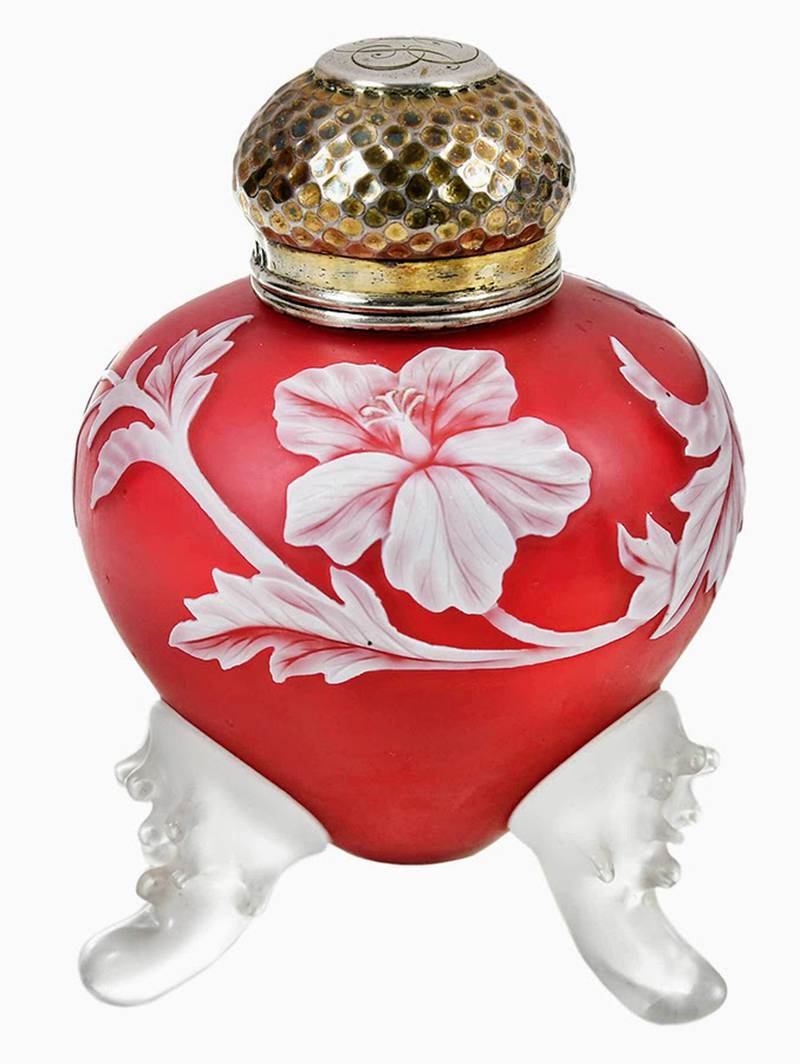 An eye-catching design by a famous glassmaker brought a high price for this 19th-century Stevens & Williams perfume bottle.