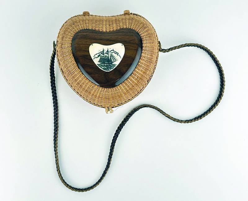 From lightship to friendship, Nantucket baskets have come a long way. Their sturdy construction and craftsmanship can be seen even in a decorative shape like this one.