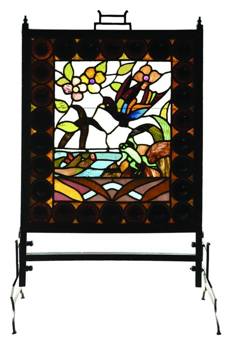 This stained-glass fire screen looks like a work of art. In front of a fire, it would look beautiful as well as providing protection from the flames.
