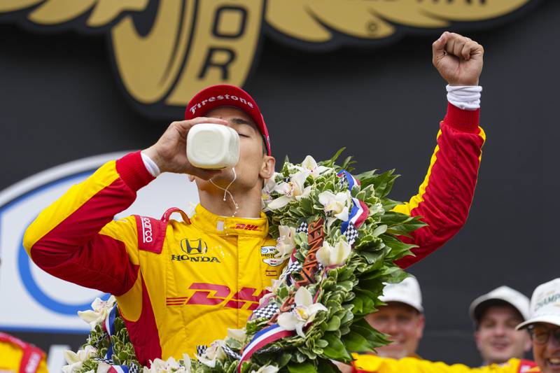Alex Palou, of Spain, celebrates after winning the Indianapolis 500 auto race at Indianapolis Motor Speedway in 2025.