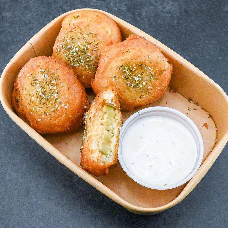 Pickle Fried Oreos by Pickle Barrel. Nothing says fair like fried pickles! Try this twist on a fair favorite. A golden Oreo with a pickle slice placed on top, dipped in an original batter, topped with dill pickle seasoning and served with a side of ranch.