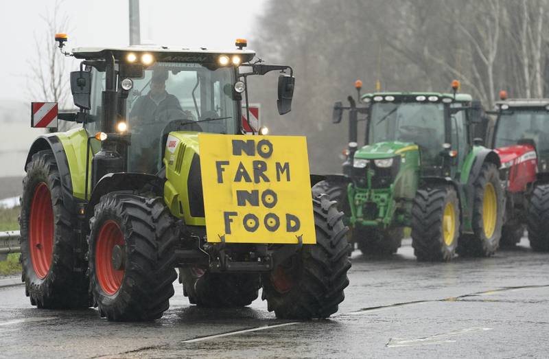 Farmers protest outside the Senedd, the Welsh parliament, over planned changes to post Brexit farming subsidies, in Cardiff, Wales.
