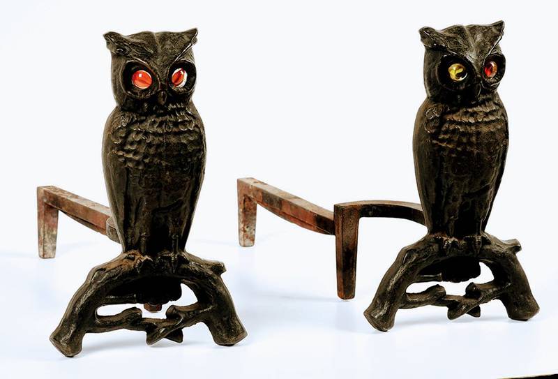 Whooo’s ready for Halloween? These shadowy owl andirons have glass marble eyes to catch the light of a fire.