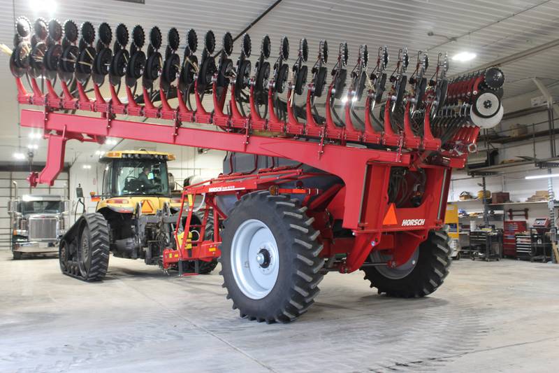 The Horsch air seeder is unfolded in the Riskedal Farms shop so Stephen Riskedal can complete some repairs. The air seeder has two tanks, which provides the ability to plant two different seeds at the same time. Most of the time, Riskedal plants at 8 mph, but if the conditions are right, he can increase that to 9.5 mph.