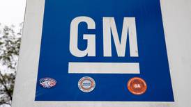 Hobbled by chip, other shortages, GM profit slides 40% in Q2